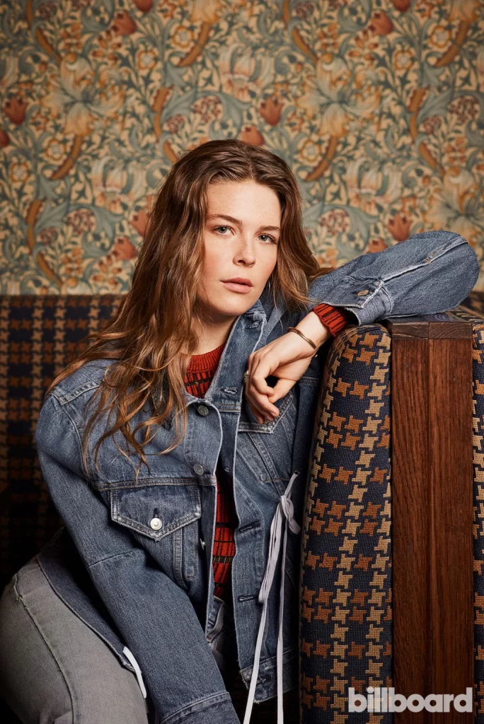 maggie rogers posing for a photo