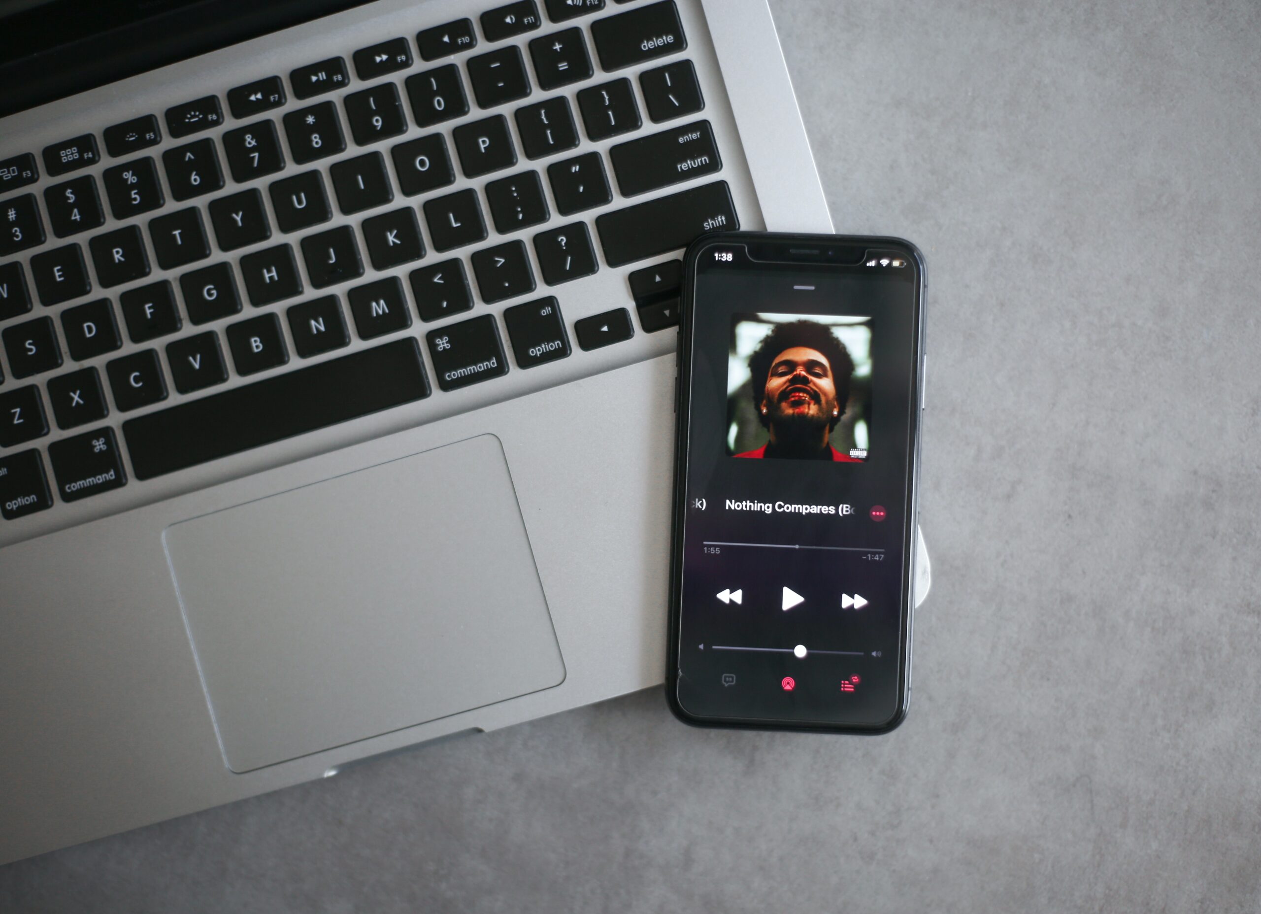 somebody listening to the weeknd on their phone