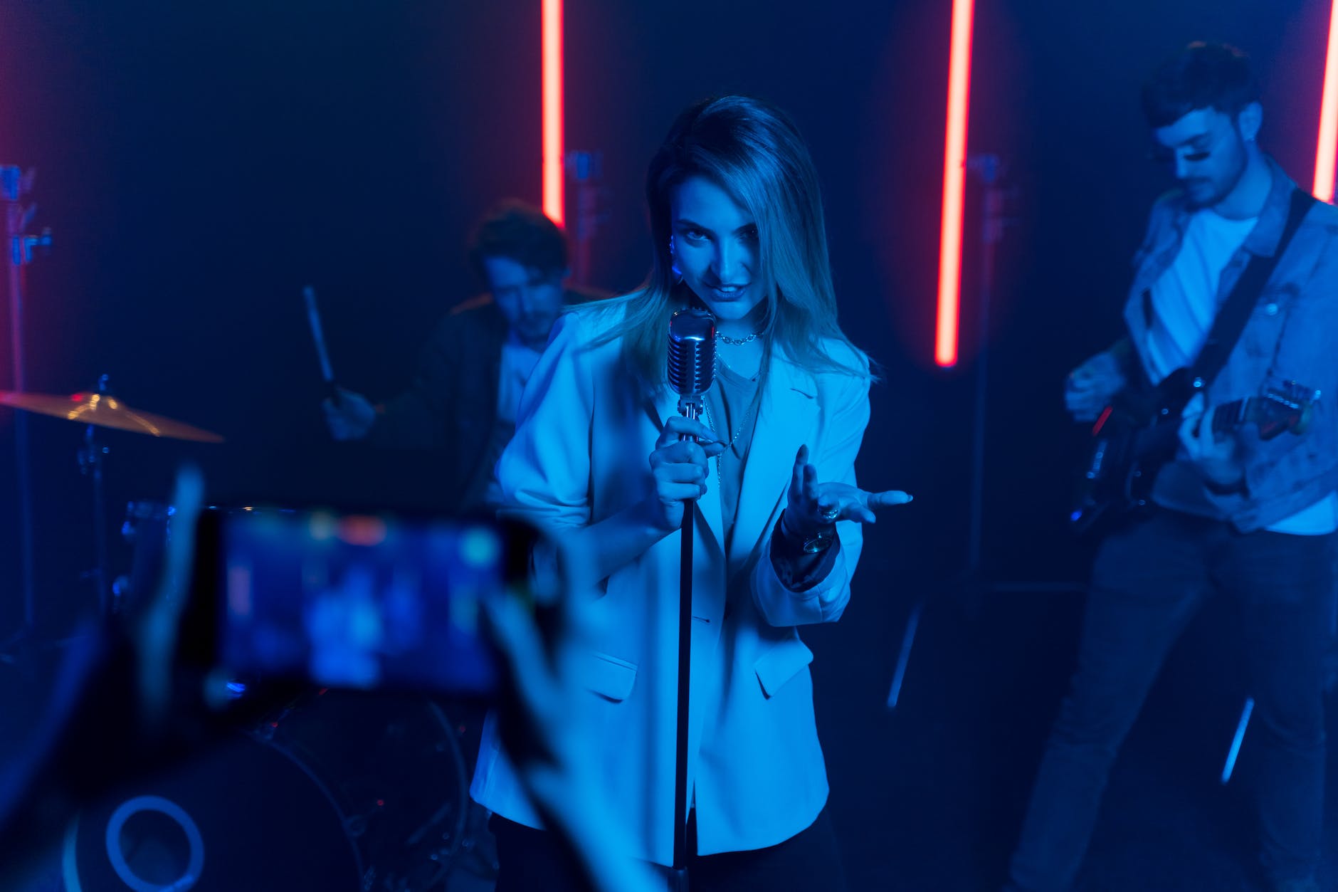 a woman holding a microphone